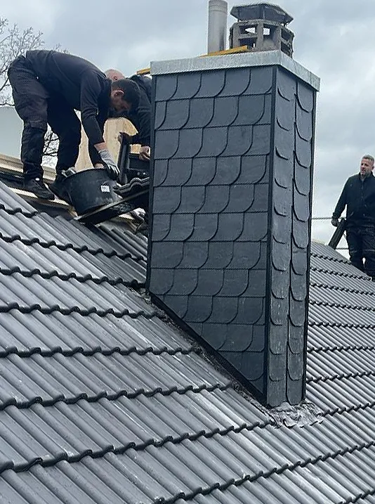 KORN Dachdecker Schornstein Dachsanierung Schieferarbeiten